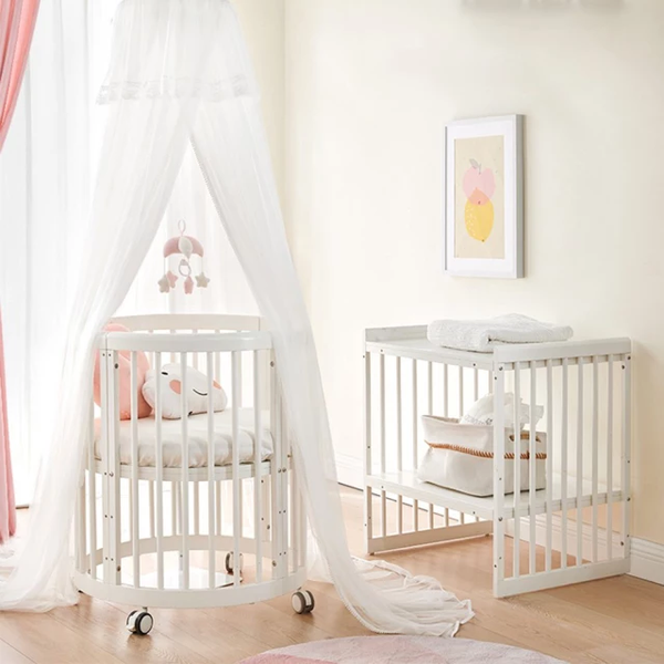 MULTI-FUNCTIONAL OVAL CRIB